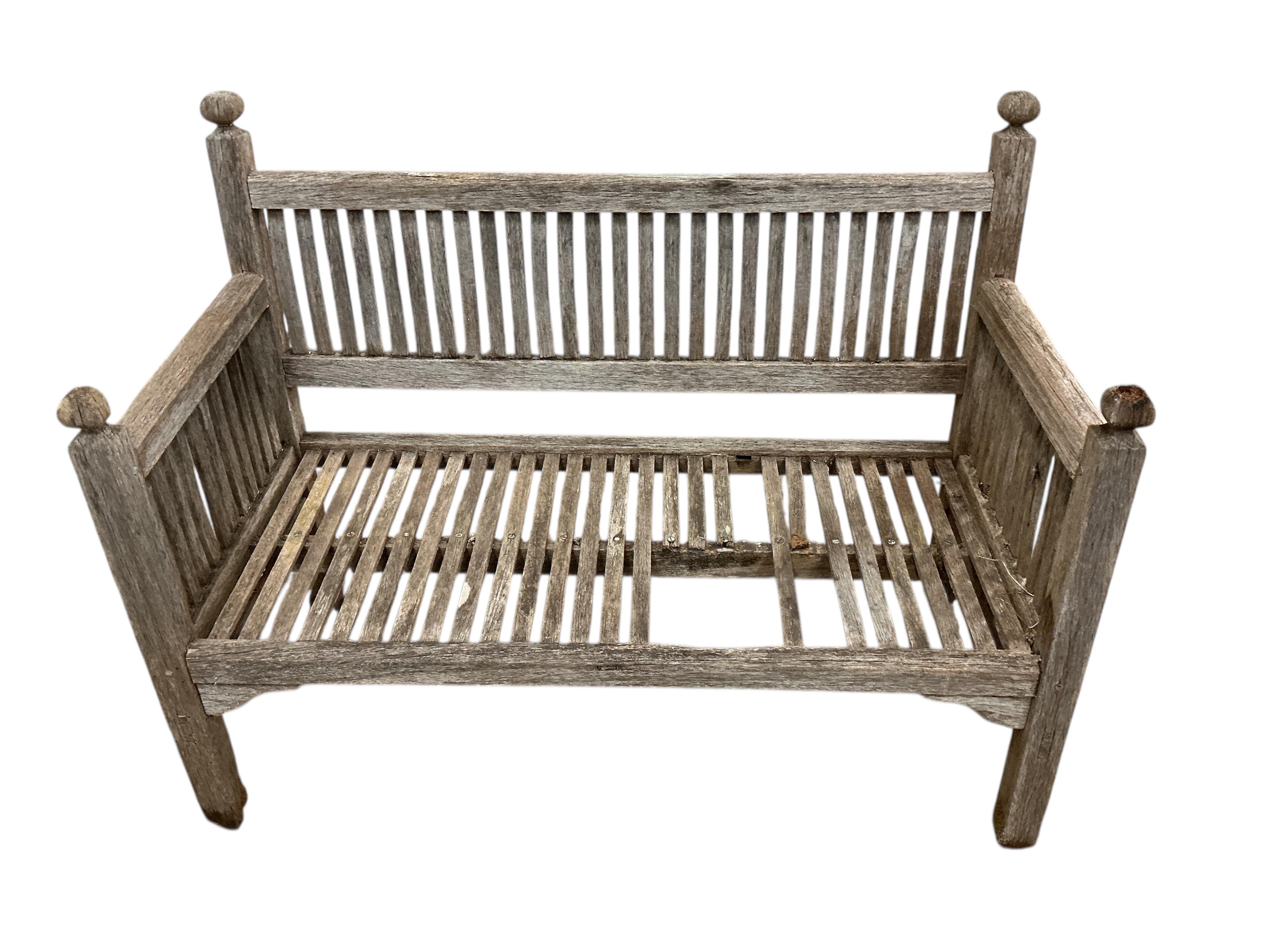 A Heals weathered teak garden bench, width 114cm, depth 56cm, height 84cm